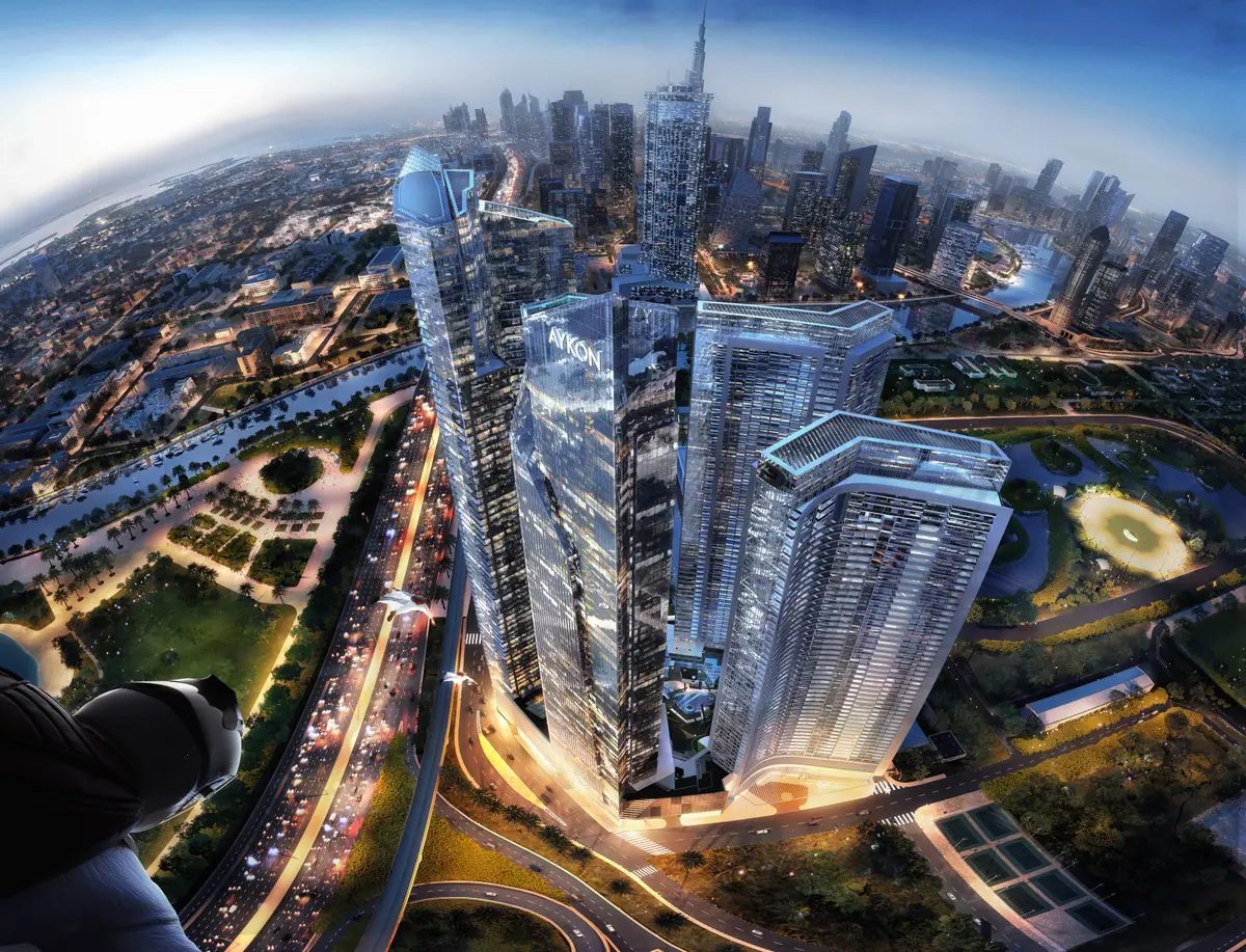 Aerial night view of glass towers in a metropolis